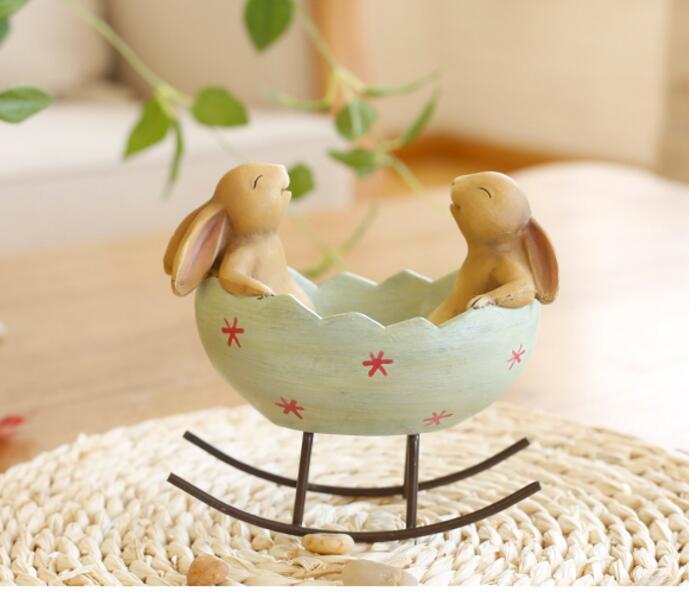 Laughing Rabbits in Egg Figurine